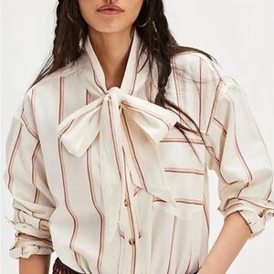 We The Free Tied With A Bow Shirt Size Large. Worn once.
Like new.